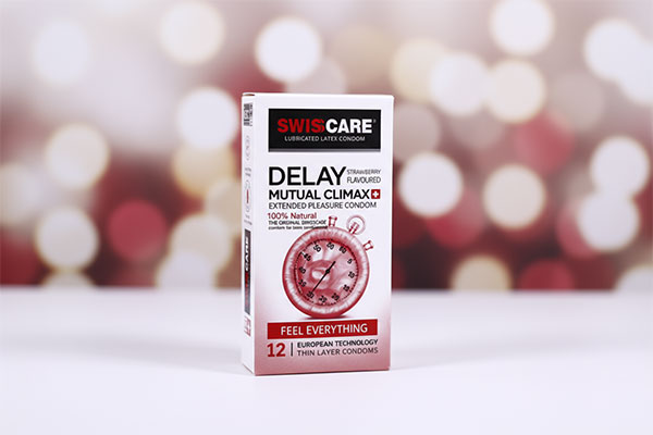 کاندوم تاخیری Delay Mutual Climax سوئیس کر 12 عددی روی سطح سفید