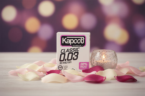 کاندوم 30 میکرون کاپوت در کنار فضایی رمانتیک