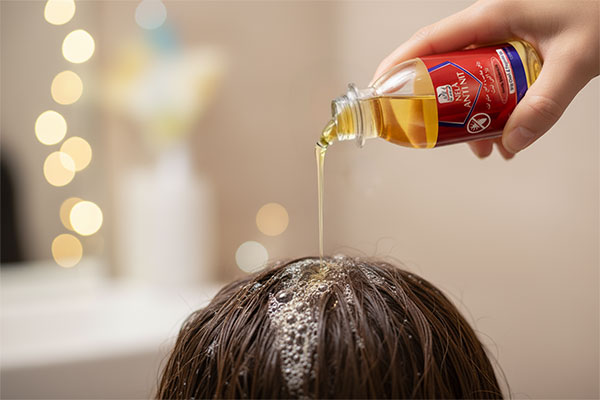 استفاده از شامپو و روغن ضد شپش نلا روی موها