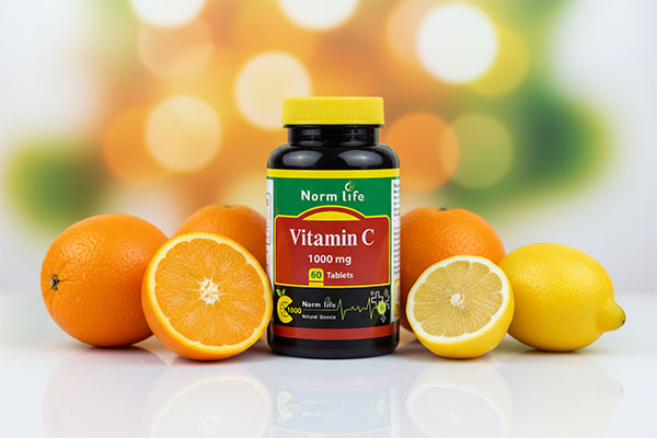 قرص ویتامین سی نورم لایف 1000 میلی گرم با میوه‌های تازه مرکبات