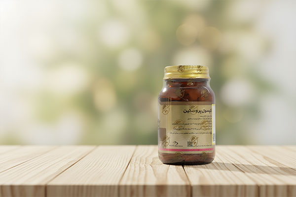 کپسول پروسکین مکس اونیو روی سطح چوبی