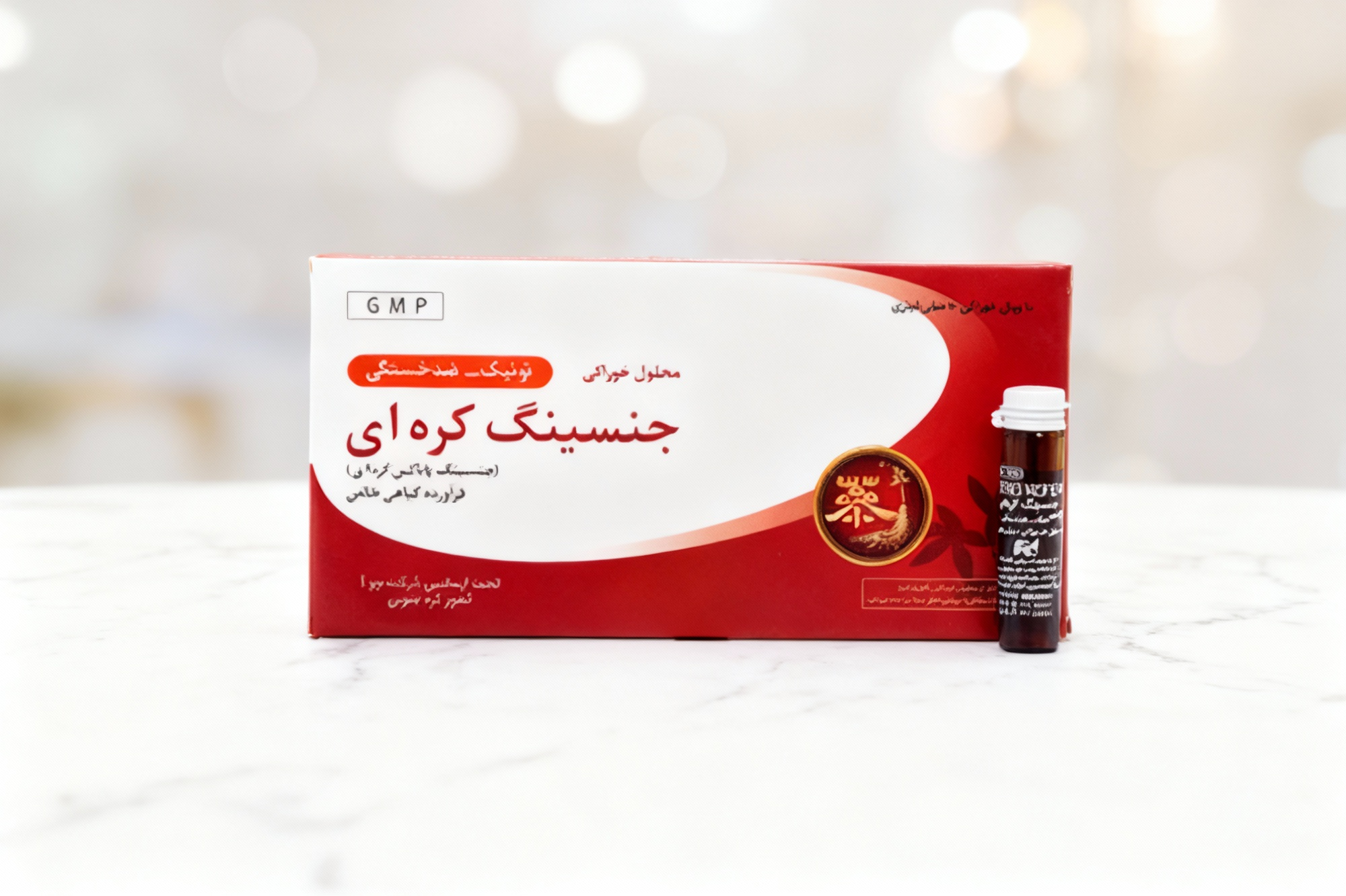 تصویر ویال جینسینگ کره ای چوافارم روی سطح مرمر سفید