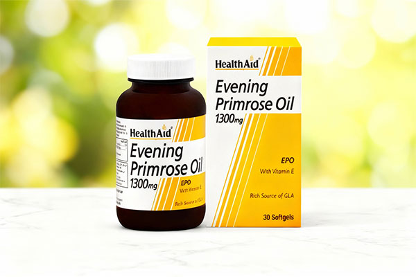 کپسول روغن گل مغربی هلث اید روی سطح مرمر سفید