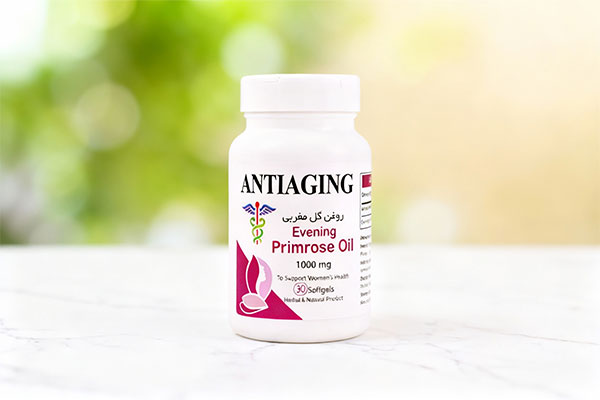 کپسول ایونینگ پریم رز اویل آنتی ایجینگ آدونیس کیش روی سطح سفید